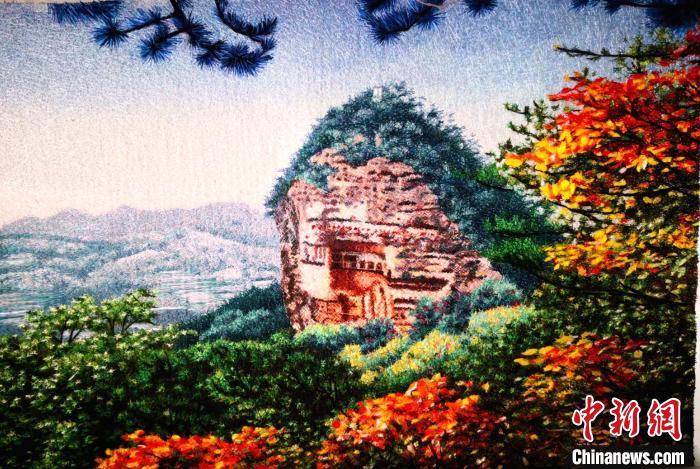 圖為劉云帆刺繡作品——麥積山石窟。(資料圖) 甘肅省非遺保護(hù)中心供圖